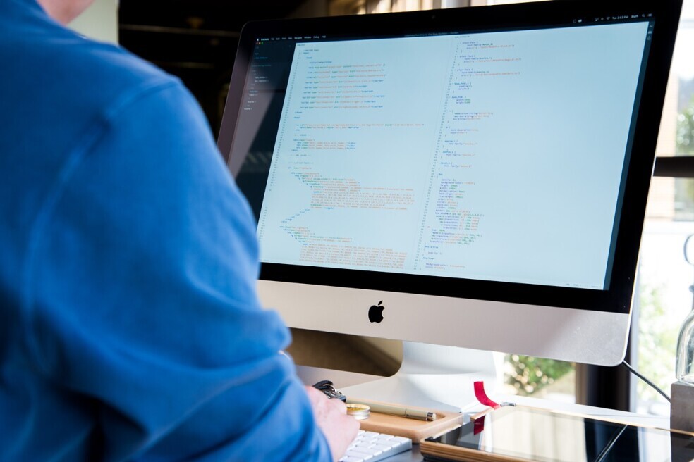 Photo of computer with large screen monitor
