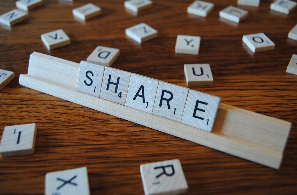 Blocks spelling out  share