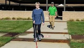 Woman with a white cane