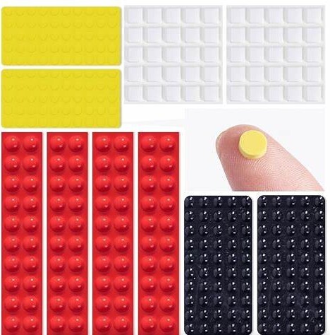 Assorted tactile bump dots in various colors, shapes, and sizes